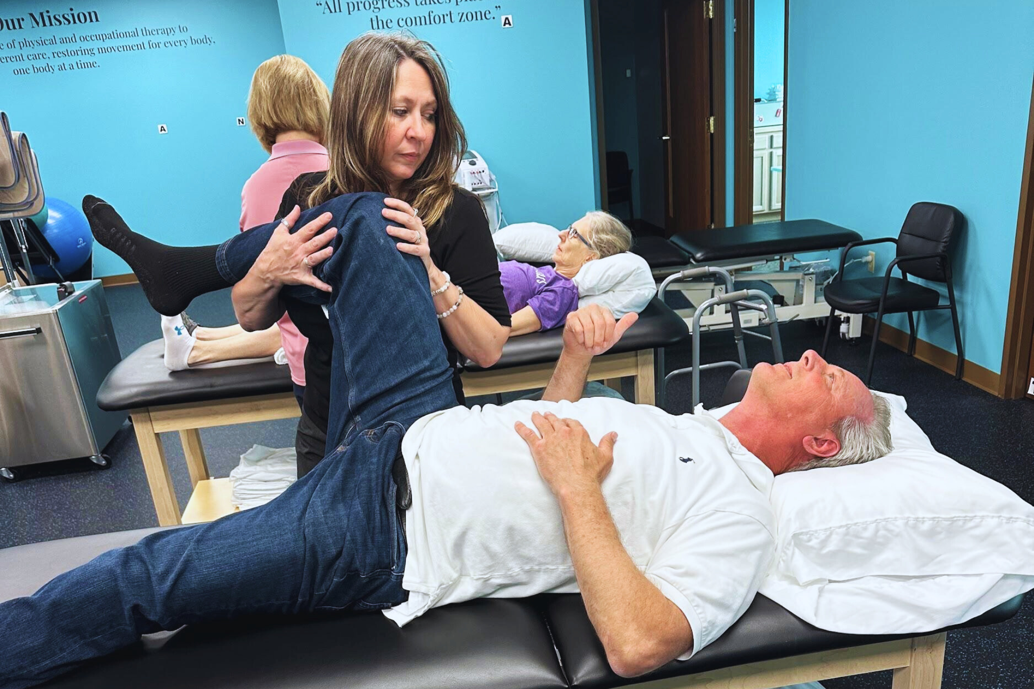 Physical Therapist Healing Patient Hip back Pain